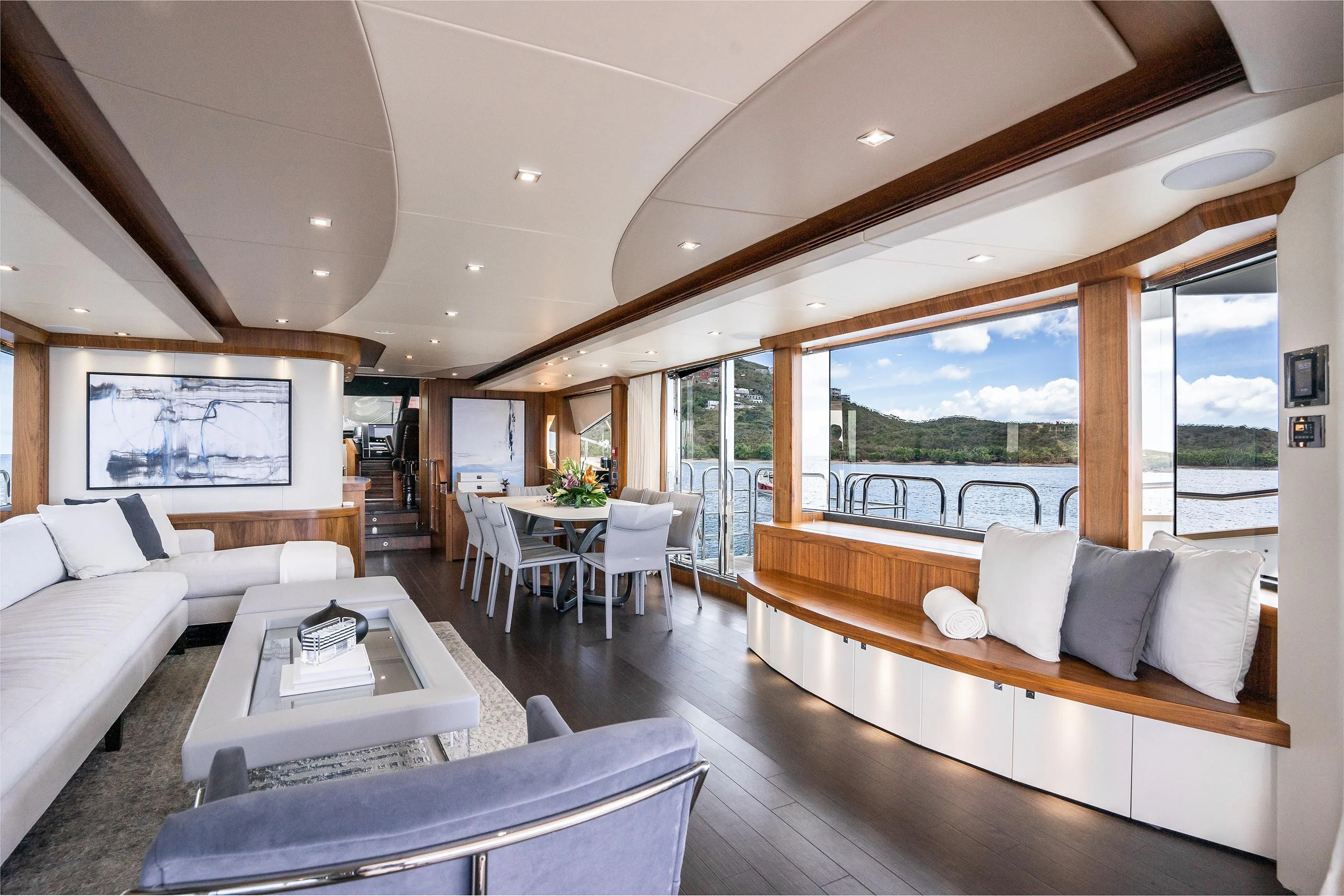 a living room with a large window aboard ELITE Yacht for Sale