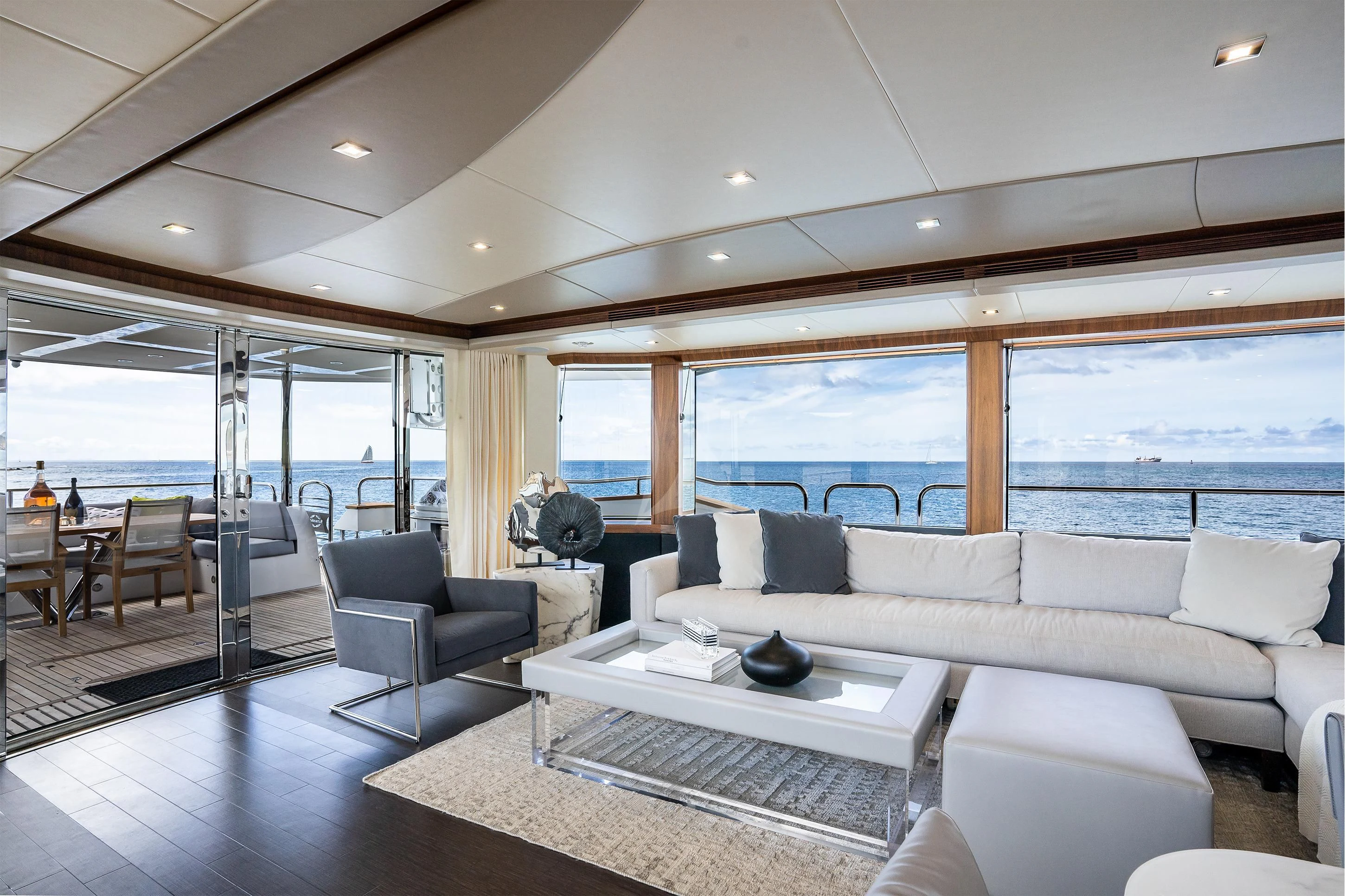 a living room with a large glass window aboard ELITE Yacht for Sale