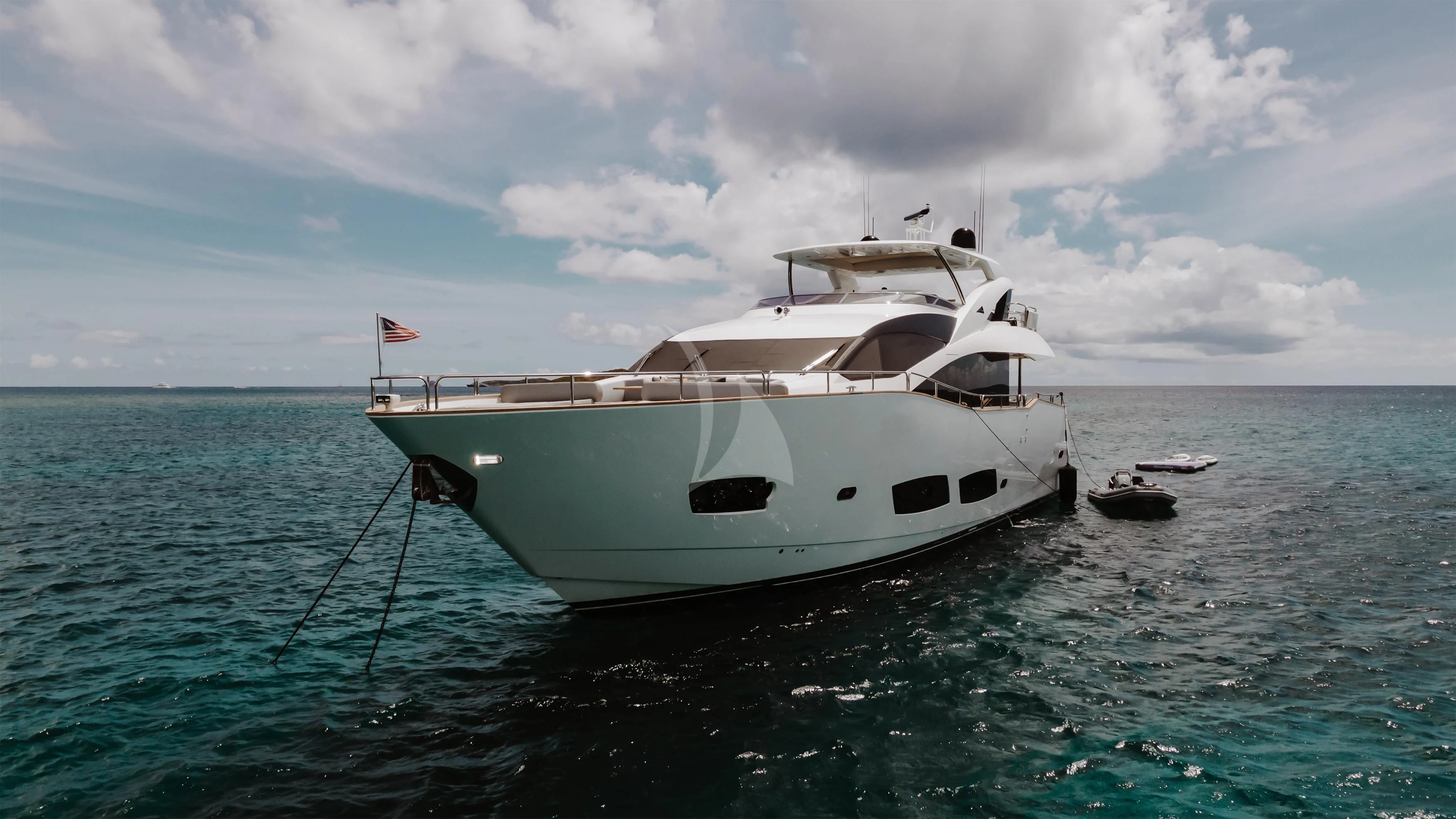 a white yacht in the water aboard ELITE Yacht for Sale