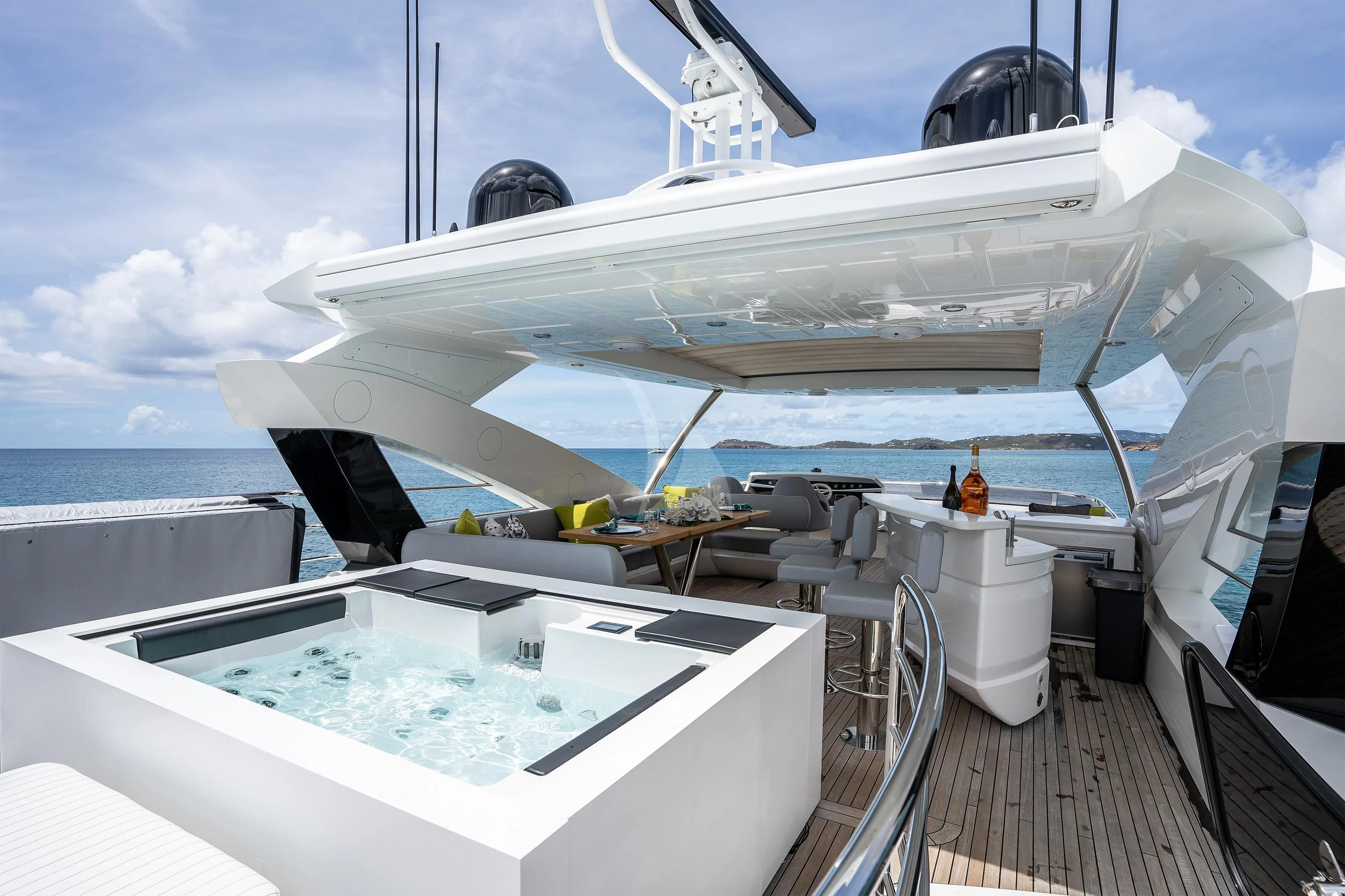 a large white ship on a deck aboard ELITE Yacht for Sale