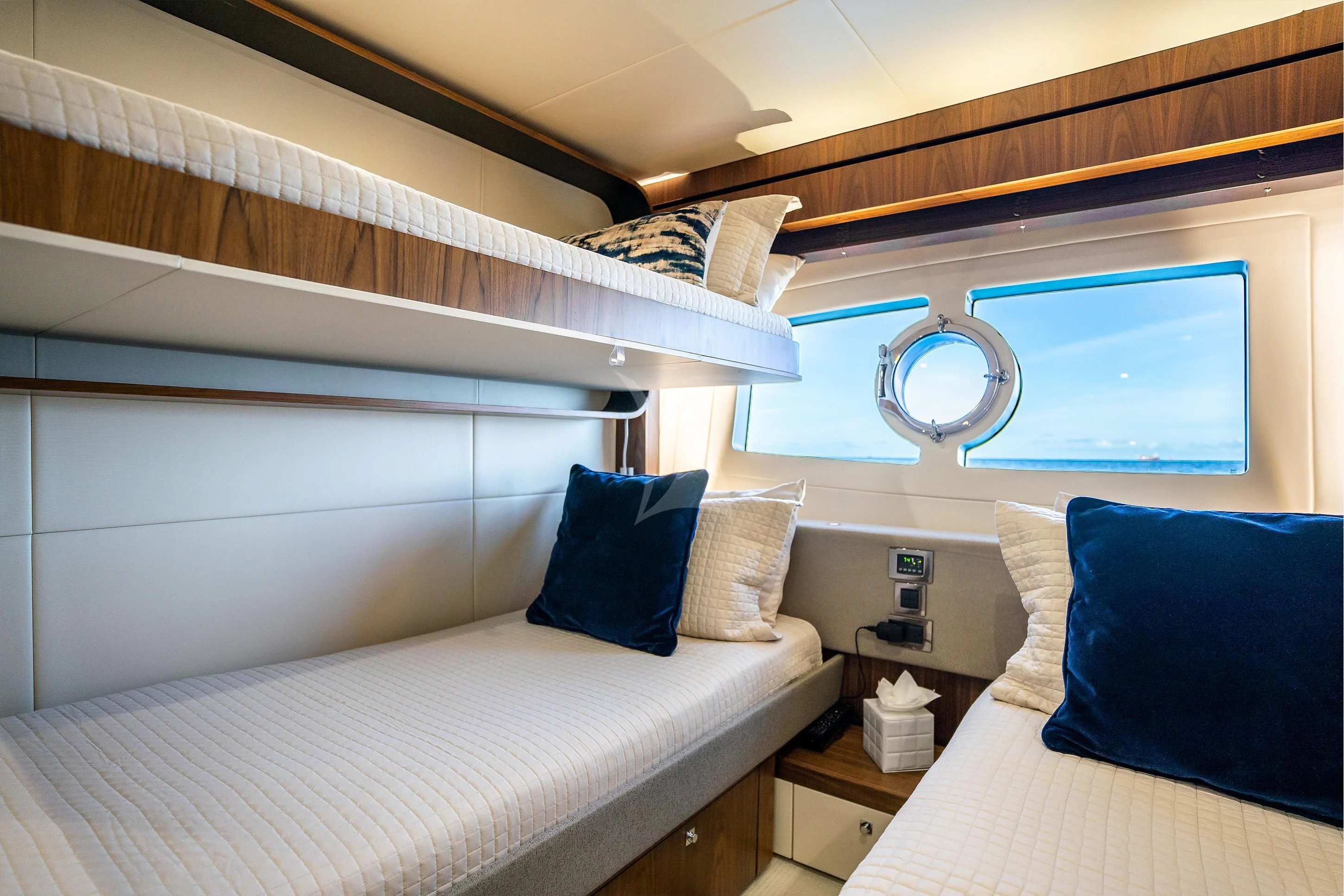 a room with a bed and a window aboard ELITE Yacht for Sale