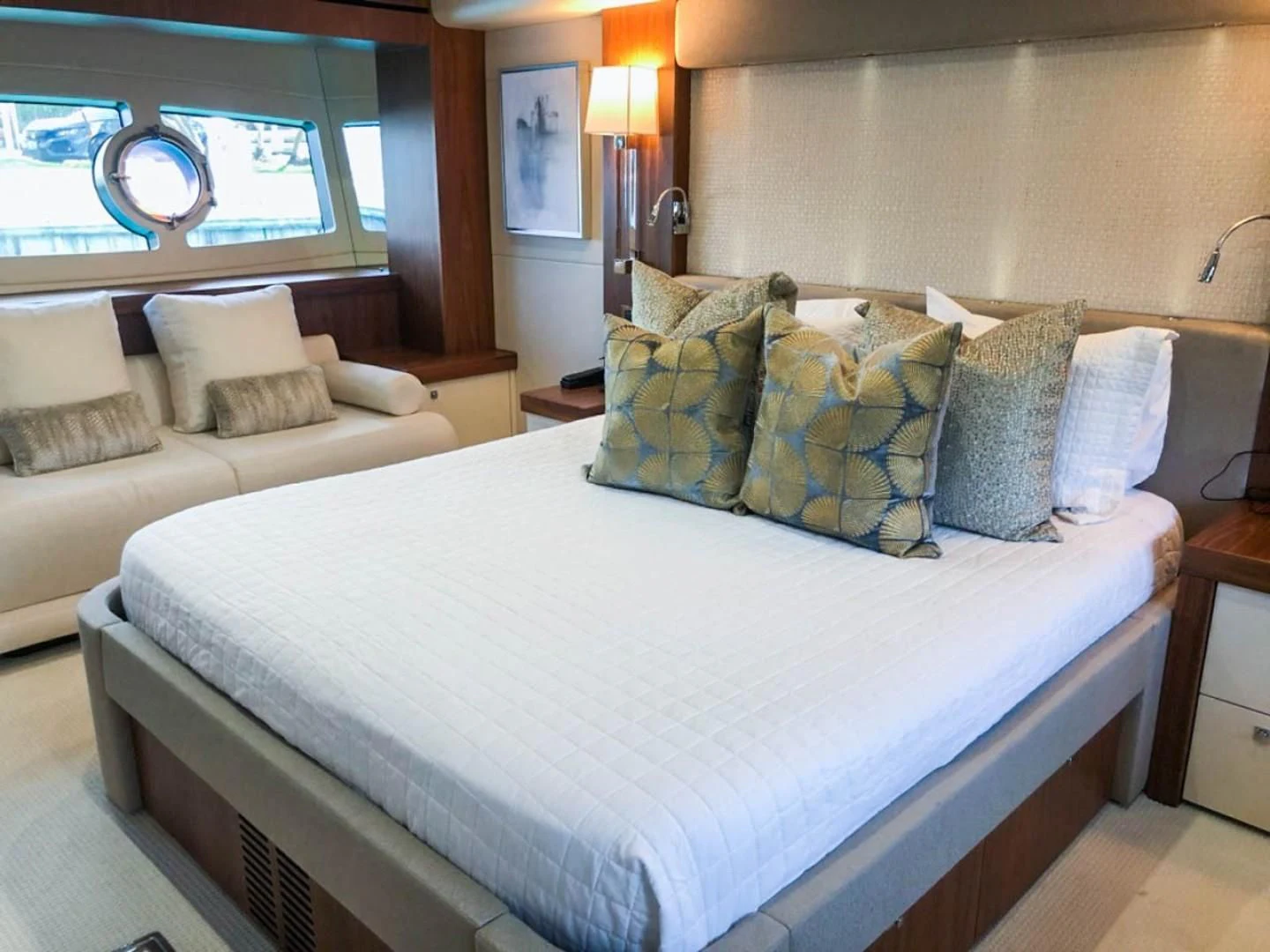a hotel room with two beds aboard ELITE Yacht for Sale