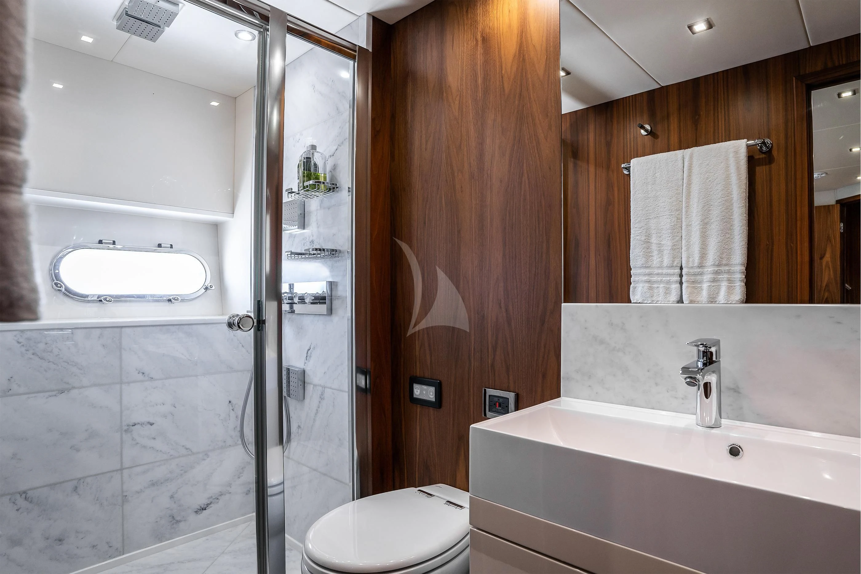 a bathroom with a shower and sink aboard ELITE Yacht for Sale