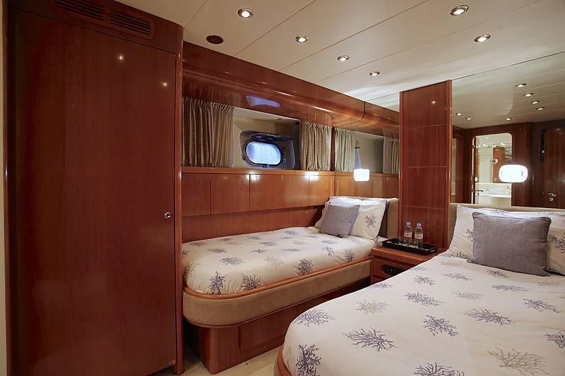 a room with two beds aboard SOHO Yacht for Sale