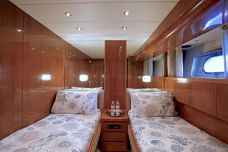 a room with two beds aboard SOHO Yacht for Sale
