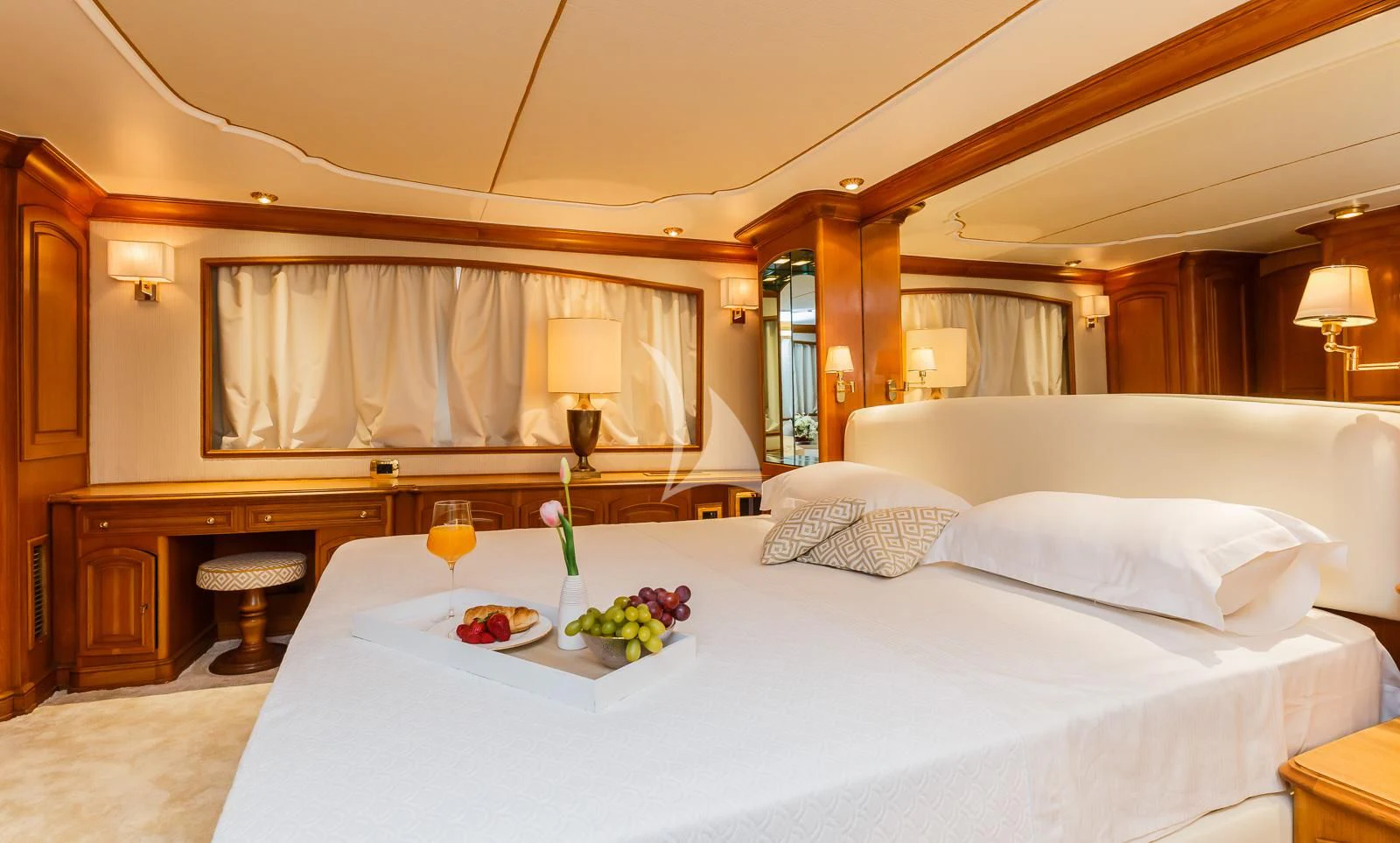 a bed with white sheets and pillows aboard TO JE TO Yacht for Sale