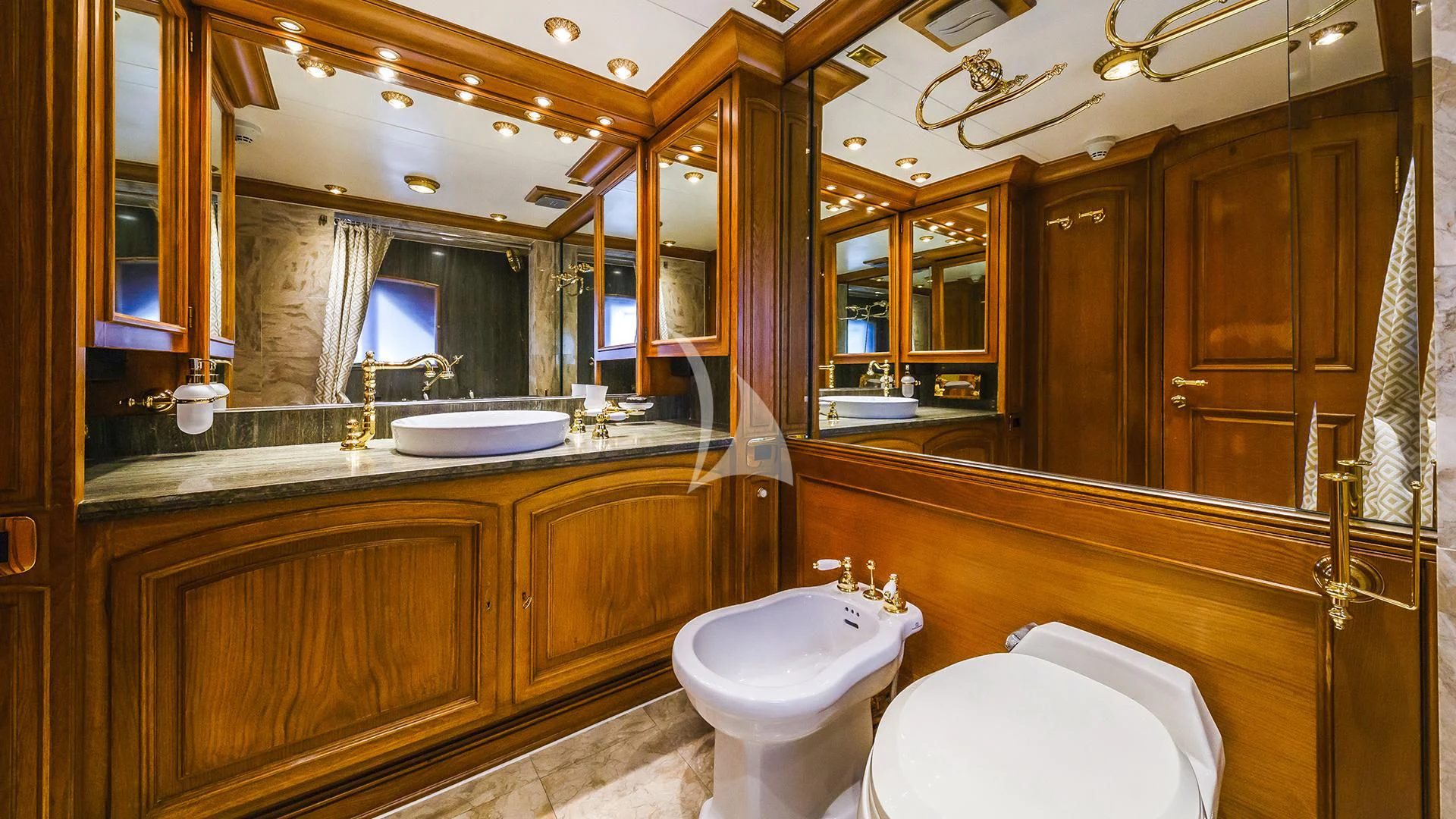 a bathroom with a large mirror aboard TO JE TO Yacht for Sale