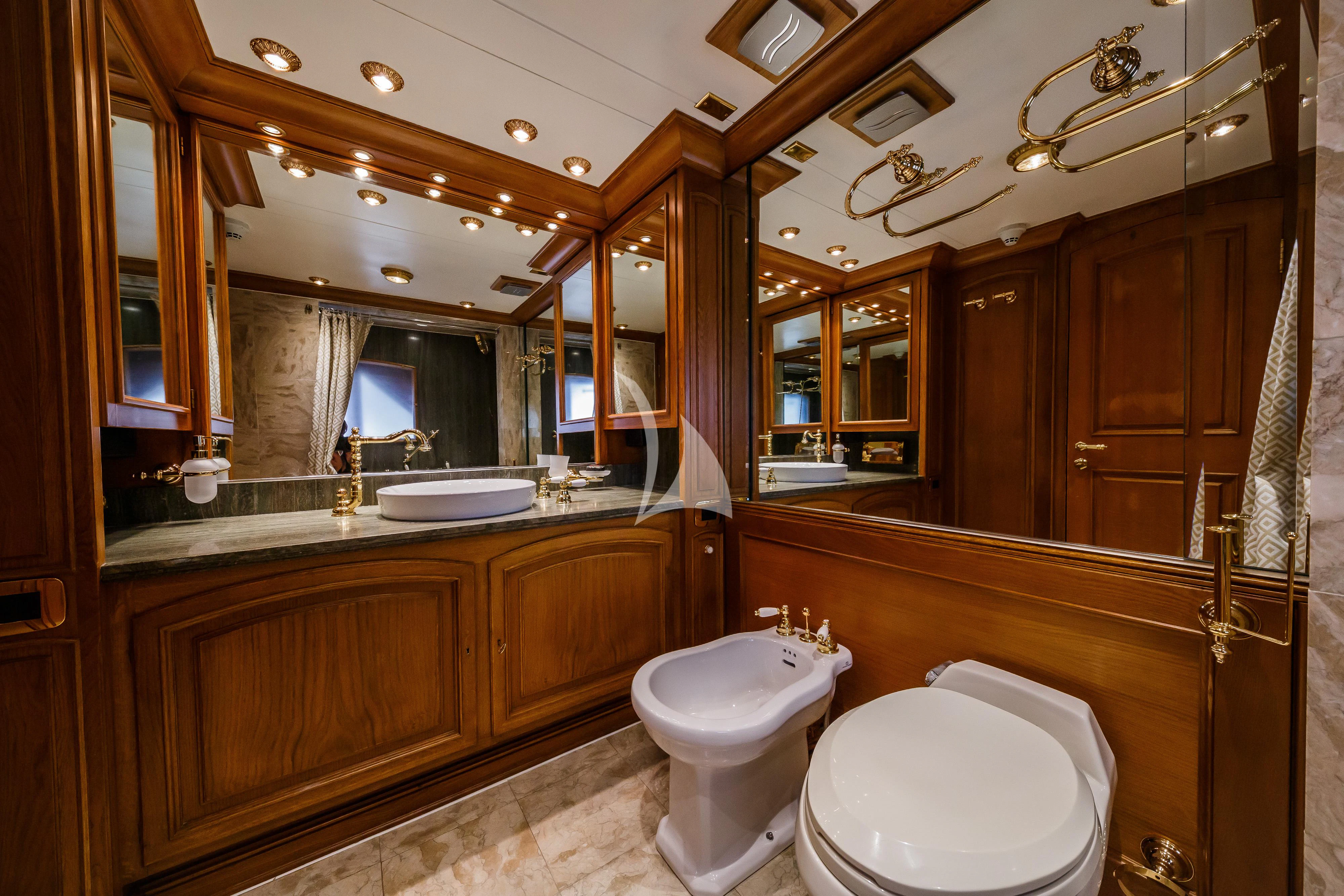 a bathroom with a large mirror aboard TO JE TO Yacht for Sale