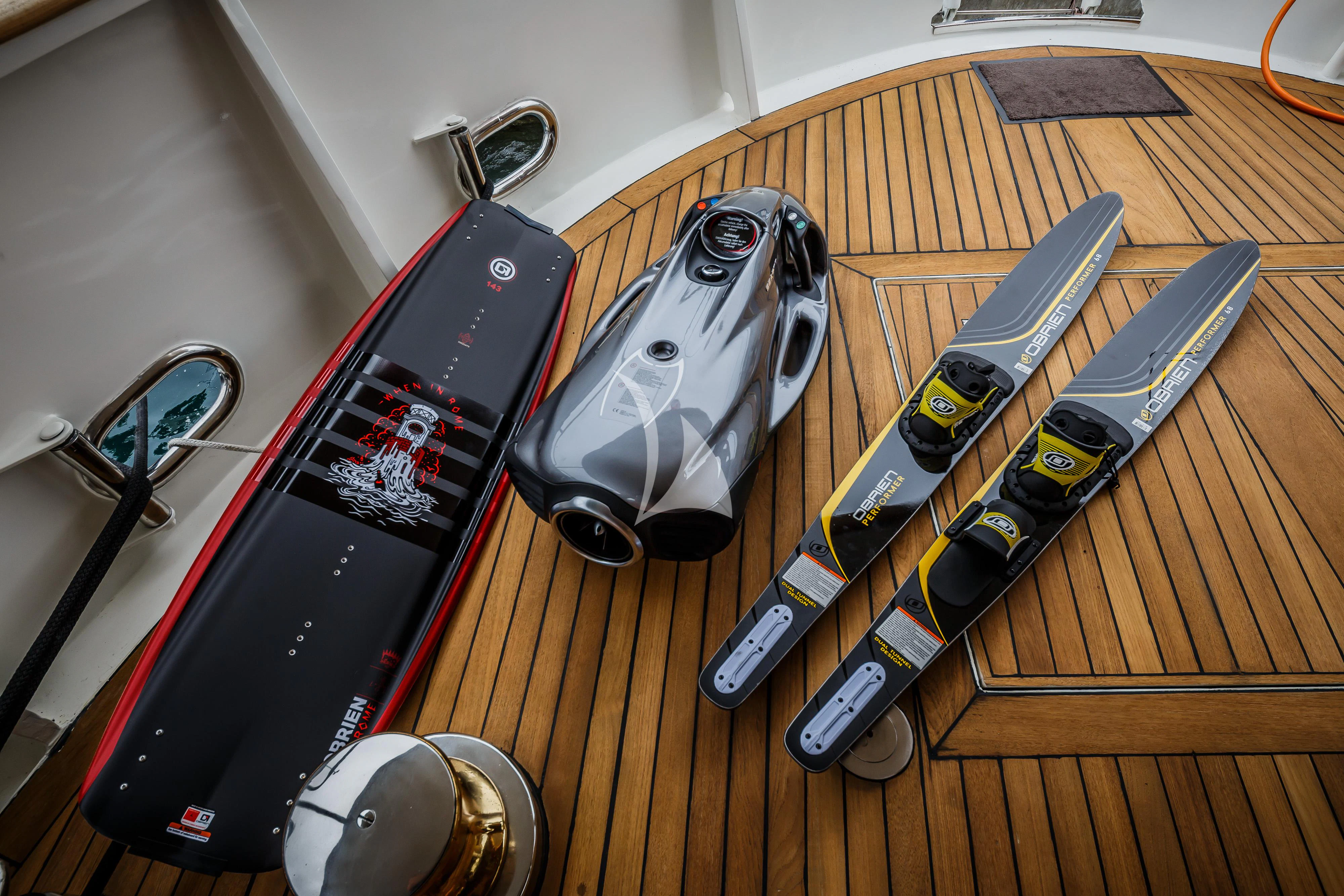 a gun and a gun on a table aboard TO JE TO Yacht for Sale