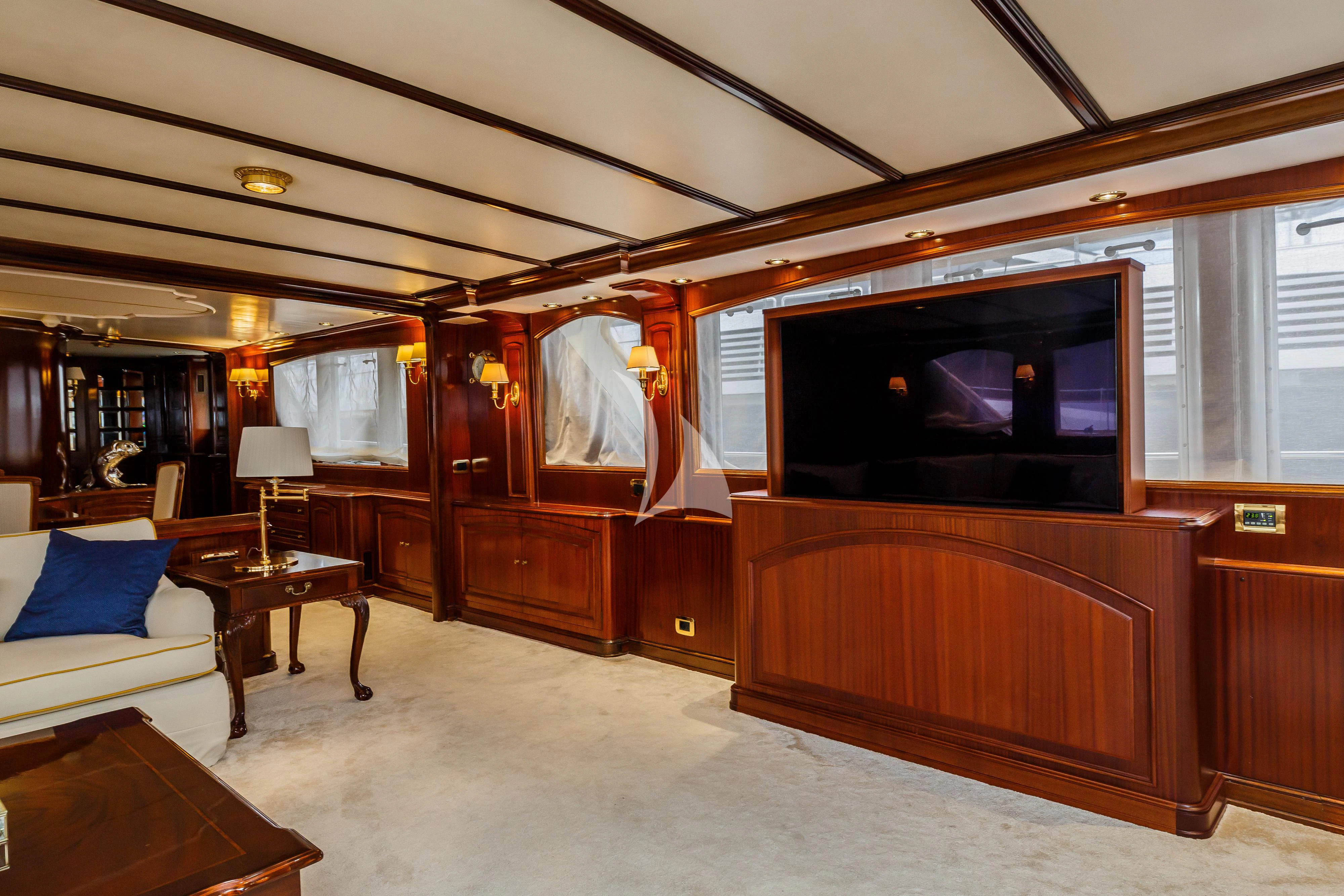 a room with a tv and a couch aboard TO JE TO Yacht for Sale