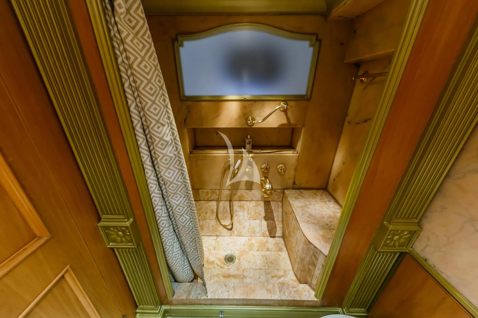 a bathroom with a glass shower aboard TO JE TO Yacht for Sale