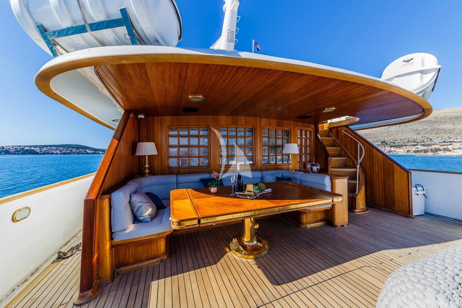 a room with a bed and a table aboard TO JE TO Yacht for Sale