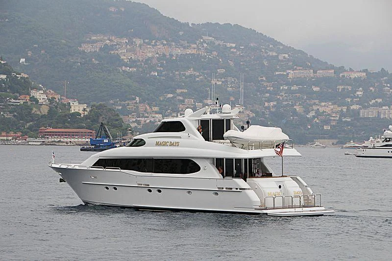 a white yacht in the water aboard BIG WAVE Yacht for Sale