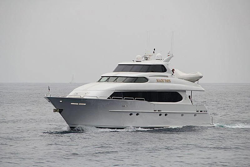 a white yacht in the water aboard BIG WAVE Yacht for Sale