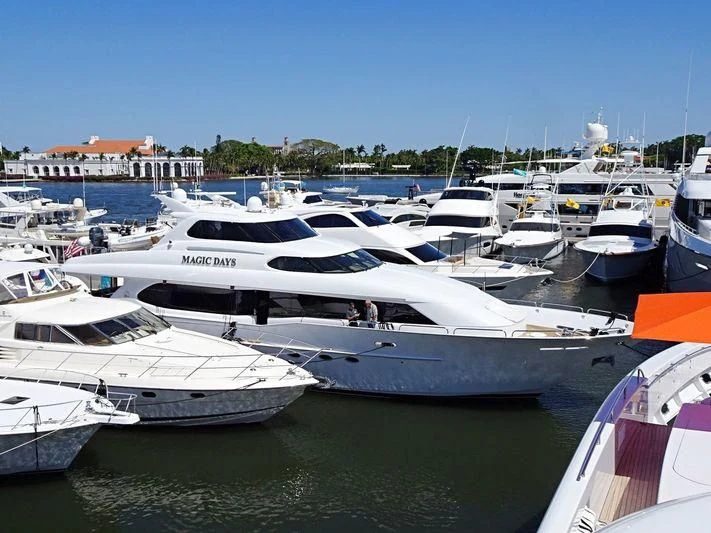 a group of boats are parked in a harbor aboard BIG WAVE Yacht for Sale