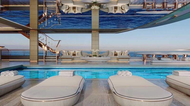 a swimming pool with several boats aboard ELF Yacht for Sale