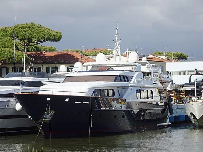 a group of boats are parked in a harbor aboard ANTARES STAR Yacht for Sale