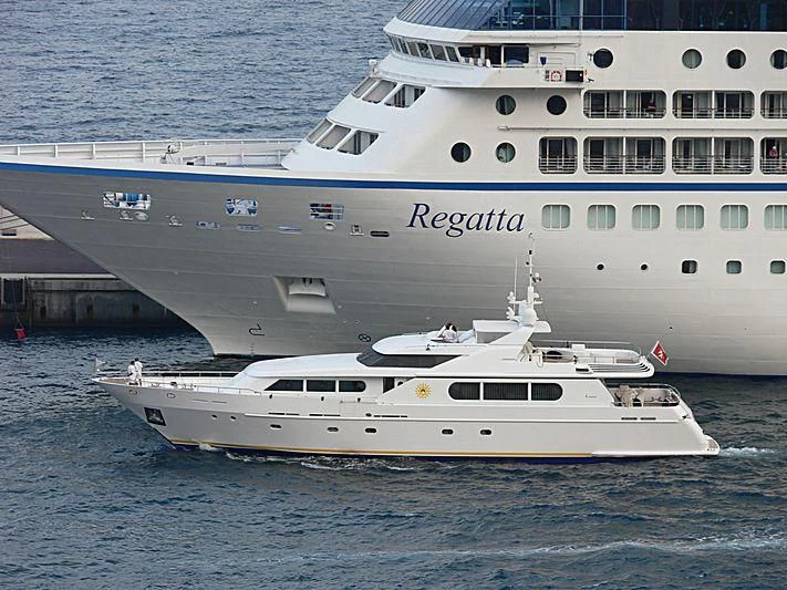 a couple of large white boats in the water aboard ANTARES STAR Yacht for Sale