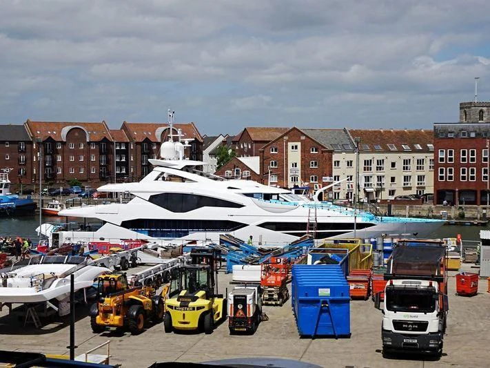 a boat docked at a port aboard NO.9 Yacht for Sale