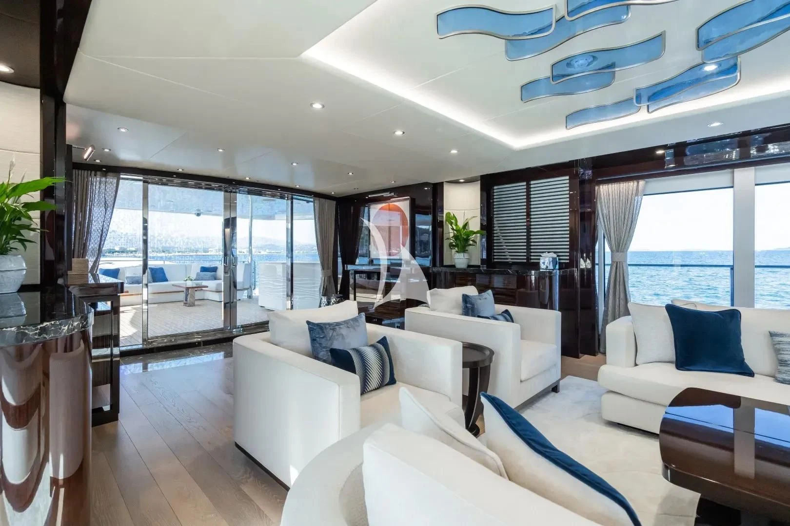 a living room with a large window aboard NO.9 Yacht for Sale