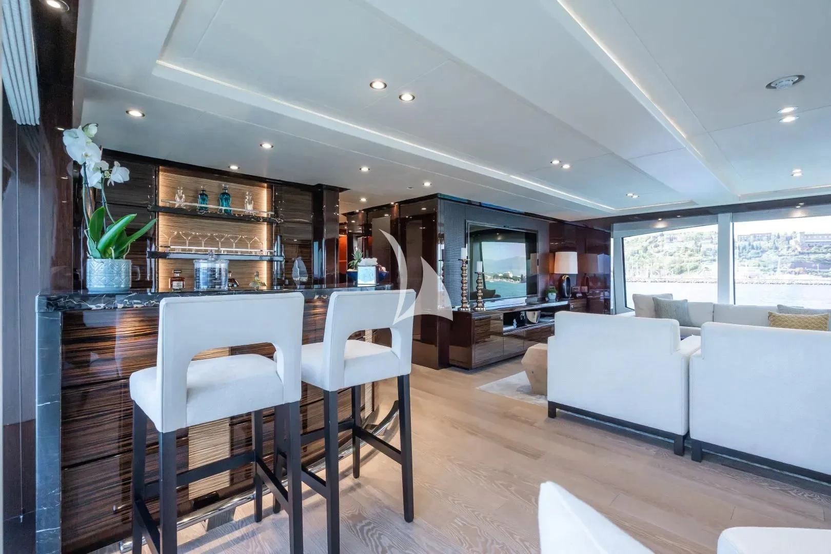 a living room with a white couch and a table aboard NO.9 Yacht for Sale