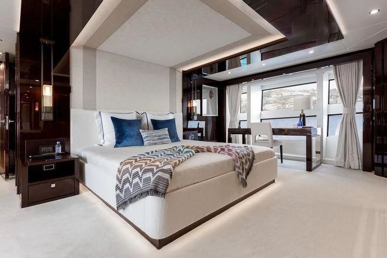 a large bedroom with a bed aboard NO.9 Yacht for Sale