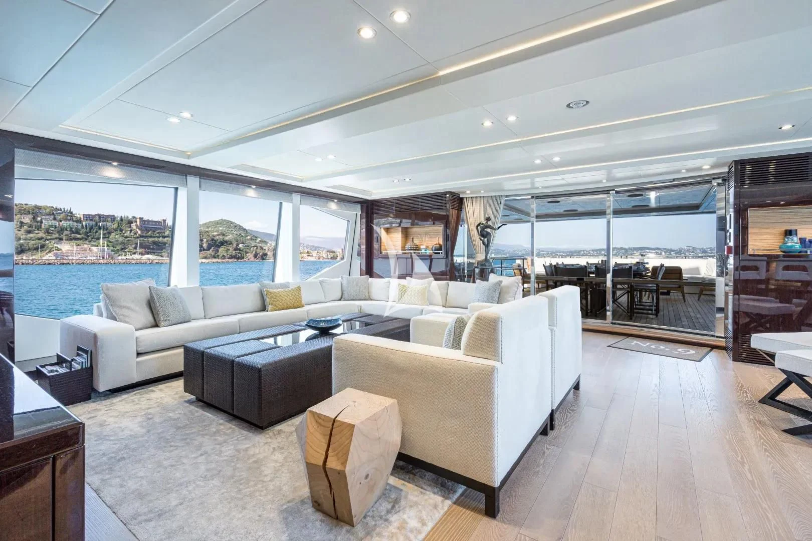 a living room with a large window aboard NO.9 Yacht for Sale