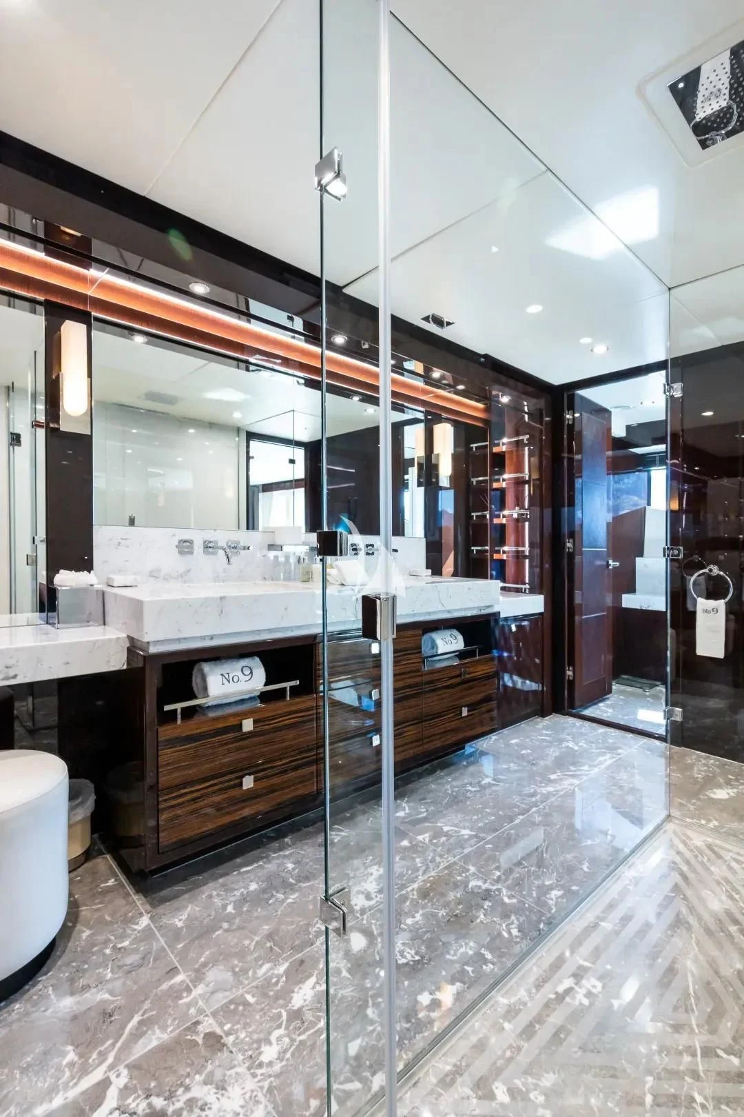 a bathroom with a large mirror aboard NO.9 Yacht for Sale