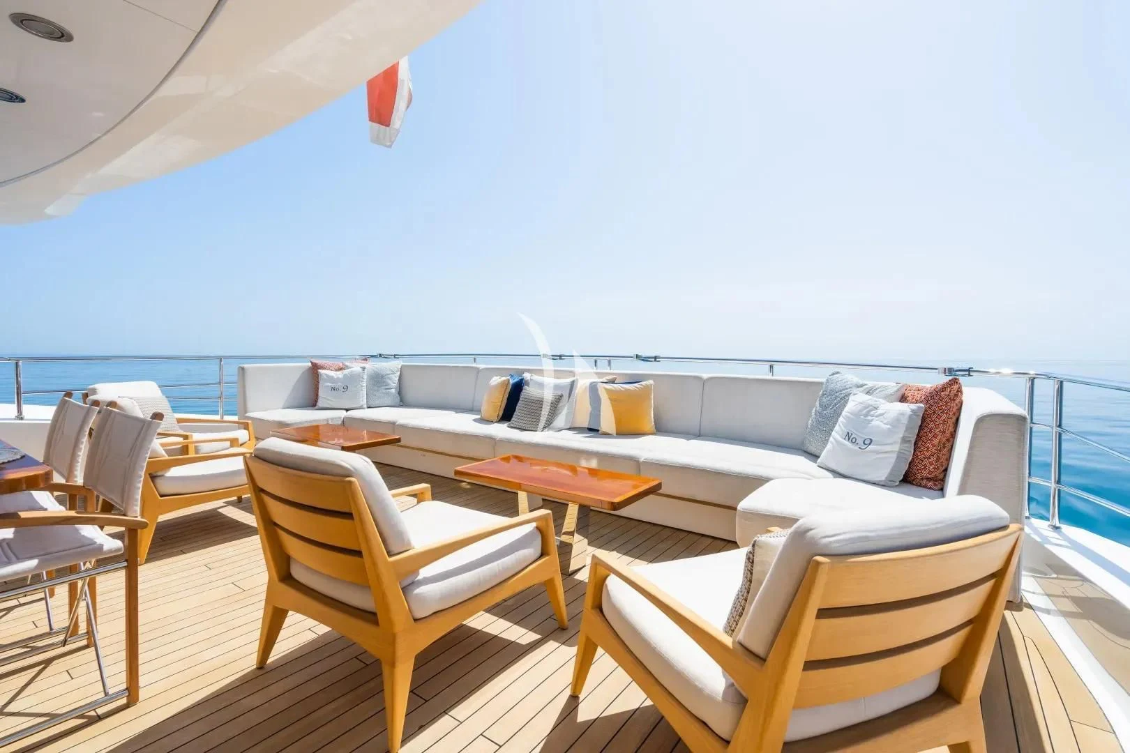 a room with a table and chairs aboard NO.9 Yacht for Sale