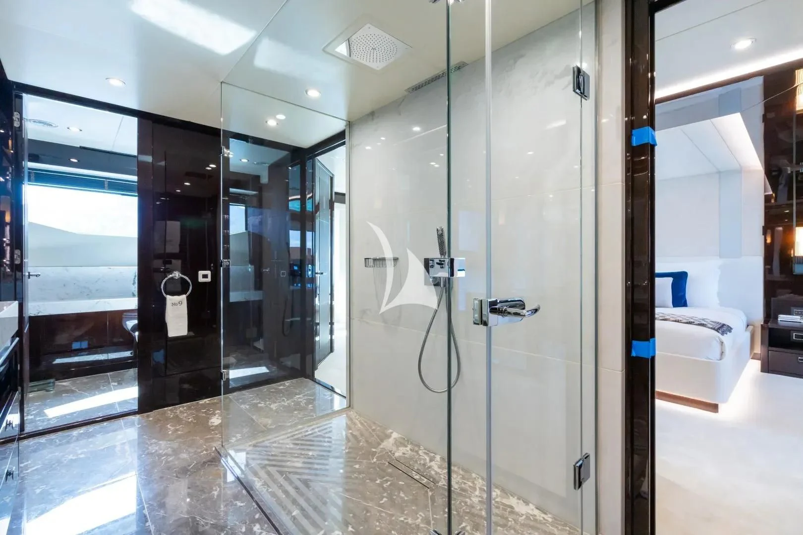 a bathroom with glass doors aboard NO.9 Yacht for Sale