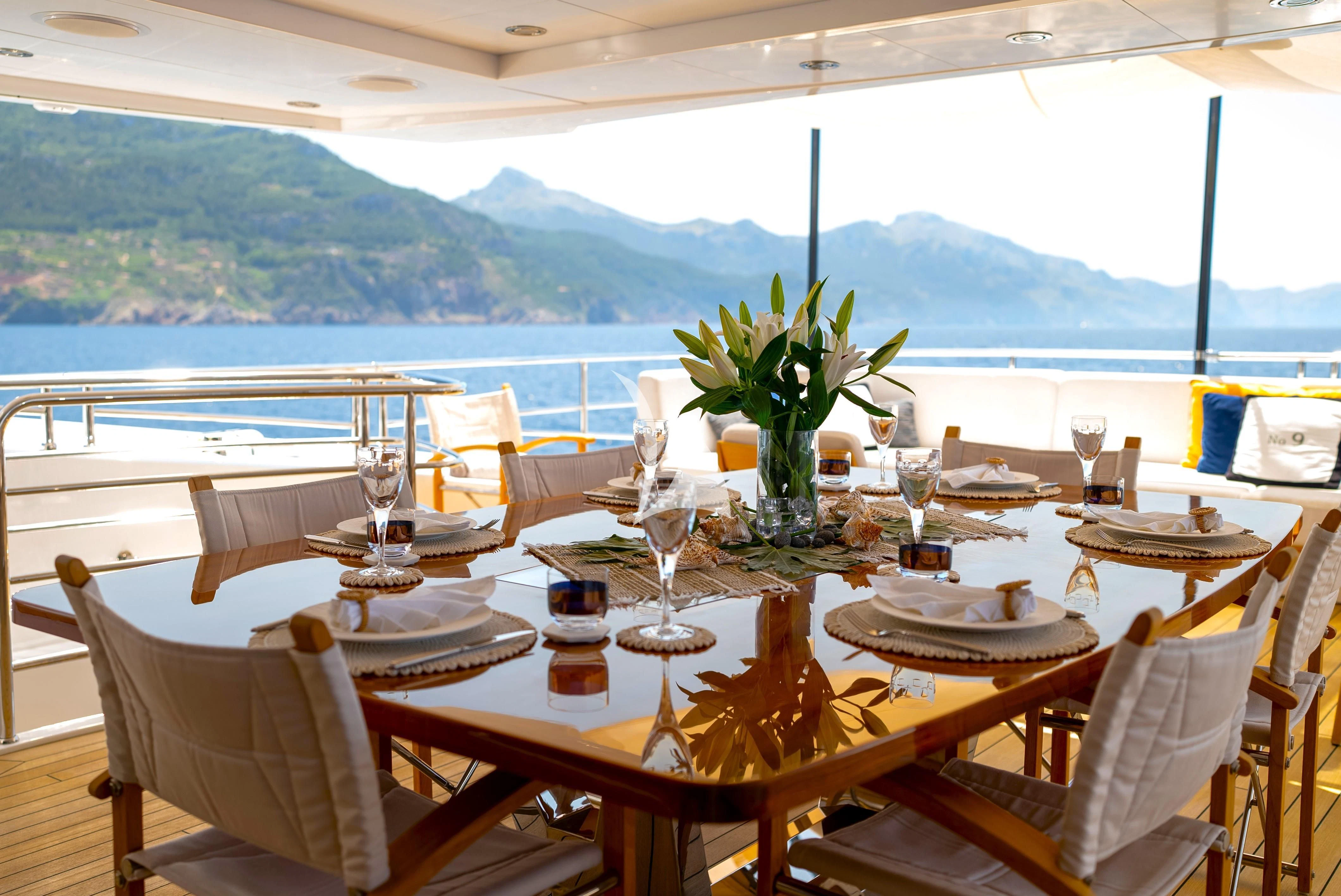 a table set for a dinner aboard NO.9 Yacht for Sale