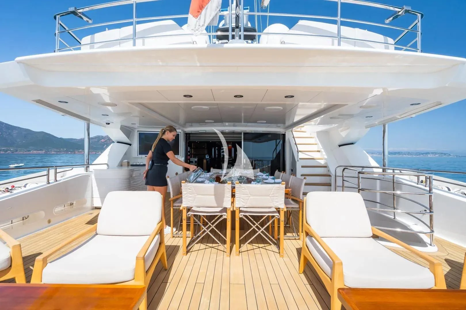 a person walking on a boat aboard NO.9 Yacht for Sale