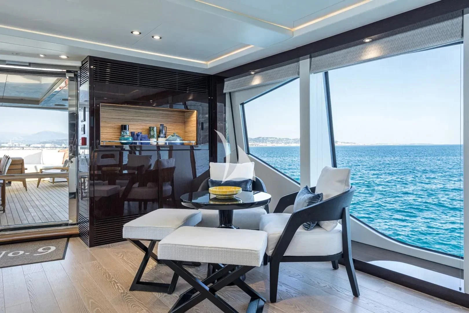 a boat with a table and chairs aboard NO.9 Yacht for Sale