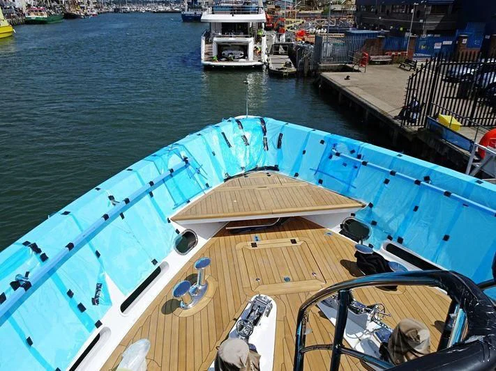 a boat docked at a pier aboard NO.9 Yacht for Sale