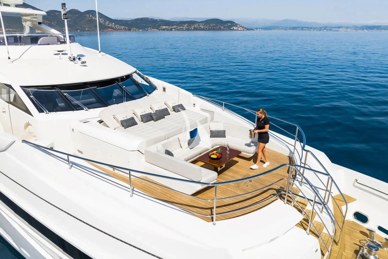 a person standing on a boat aboard NO.9 Yacht for Sale