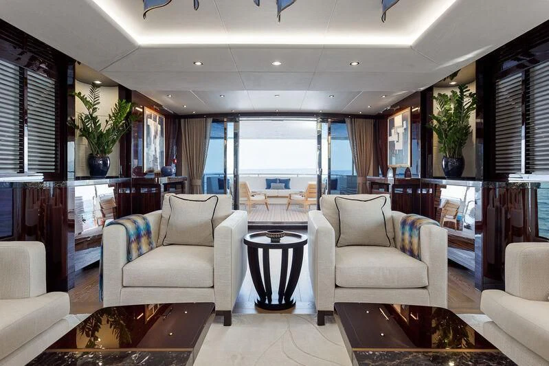a living room with a large window aboard NO.9 Yacht for Sale
