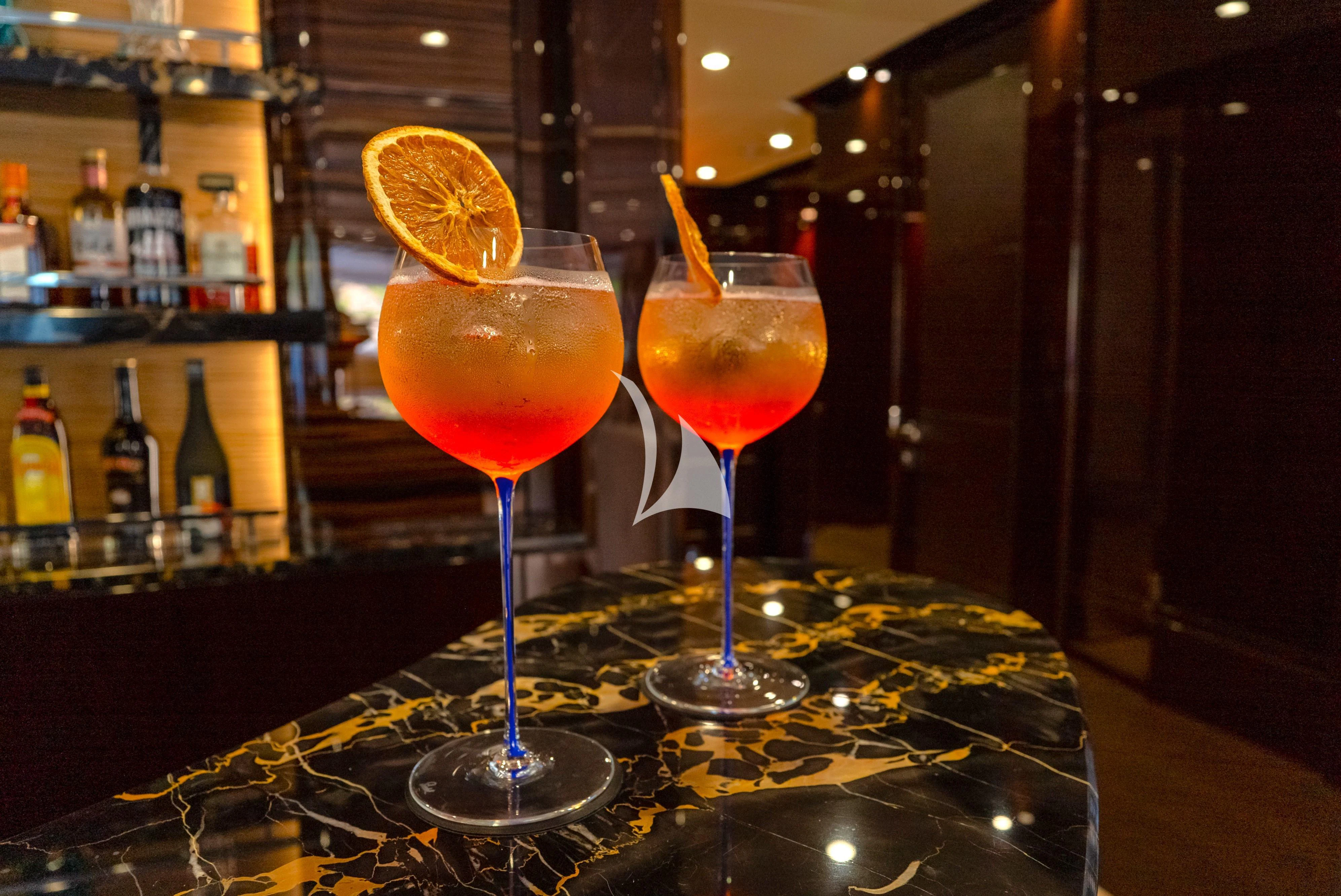 two glasses of liquid aboard NO.9 Yacht for Sale
