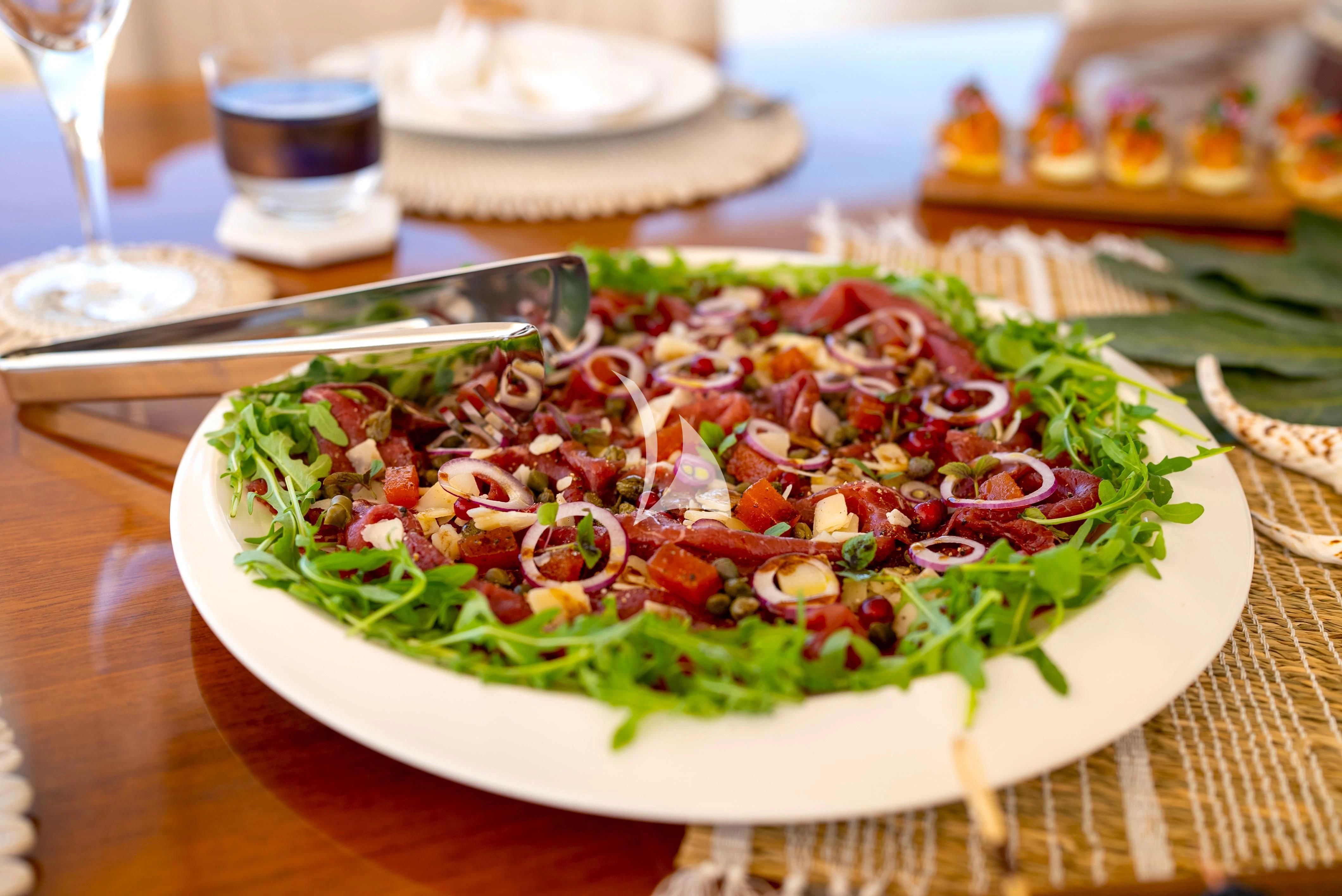 a plate of salad aboard NO.9 Yacht for Sale