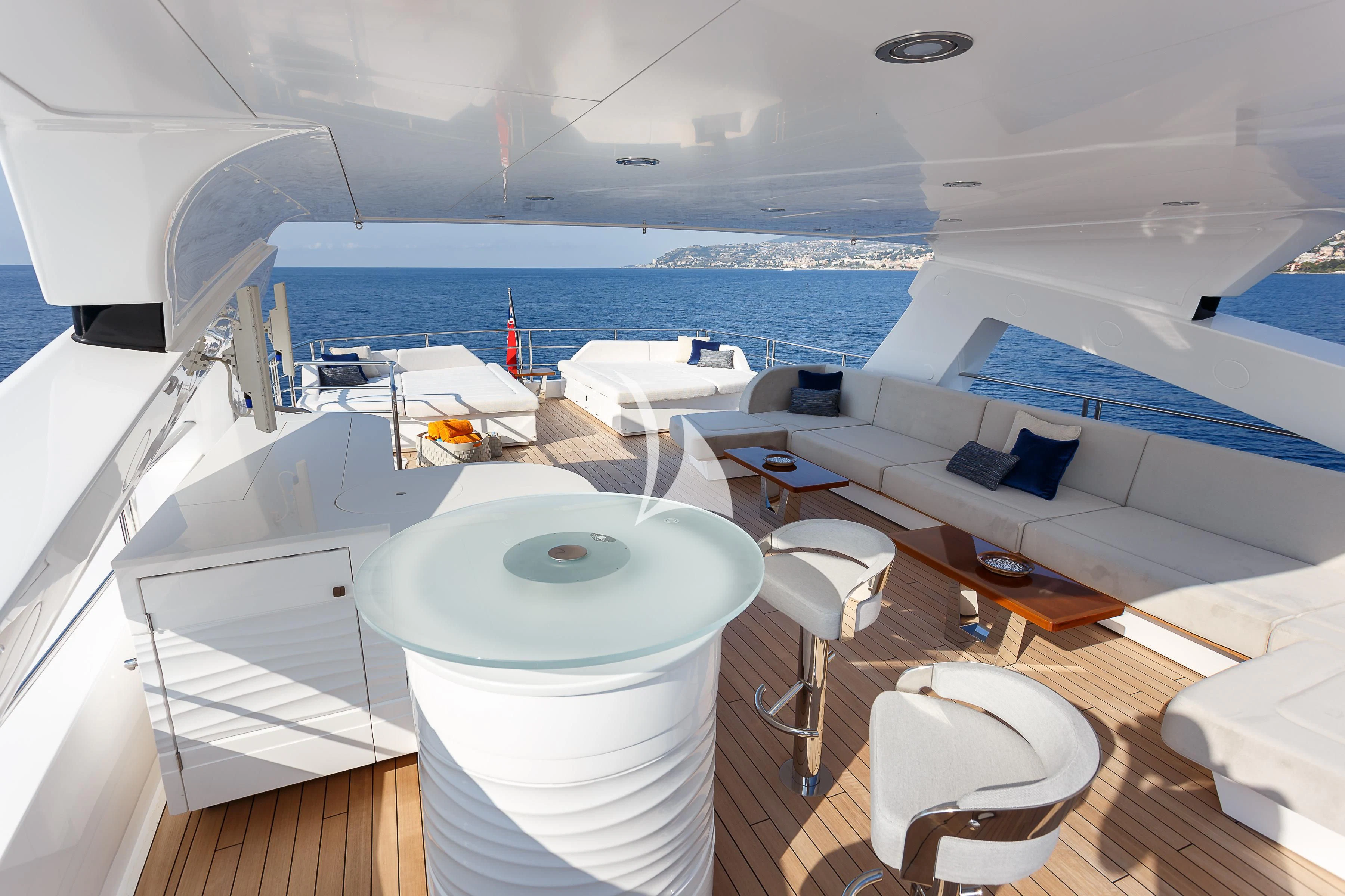 a boat with a table and chairs aboard NO.9 Yacht for Sale