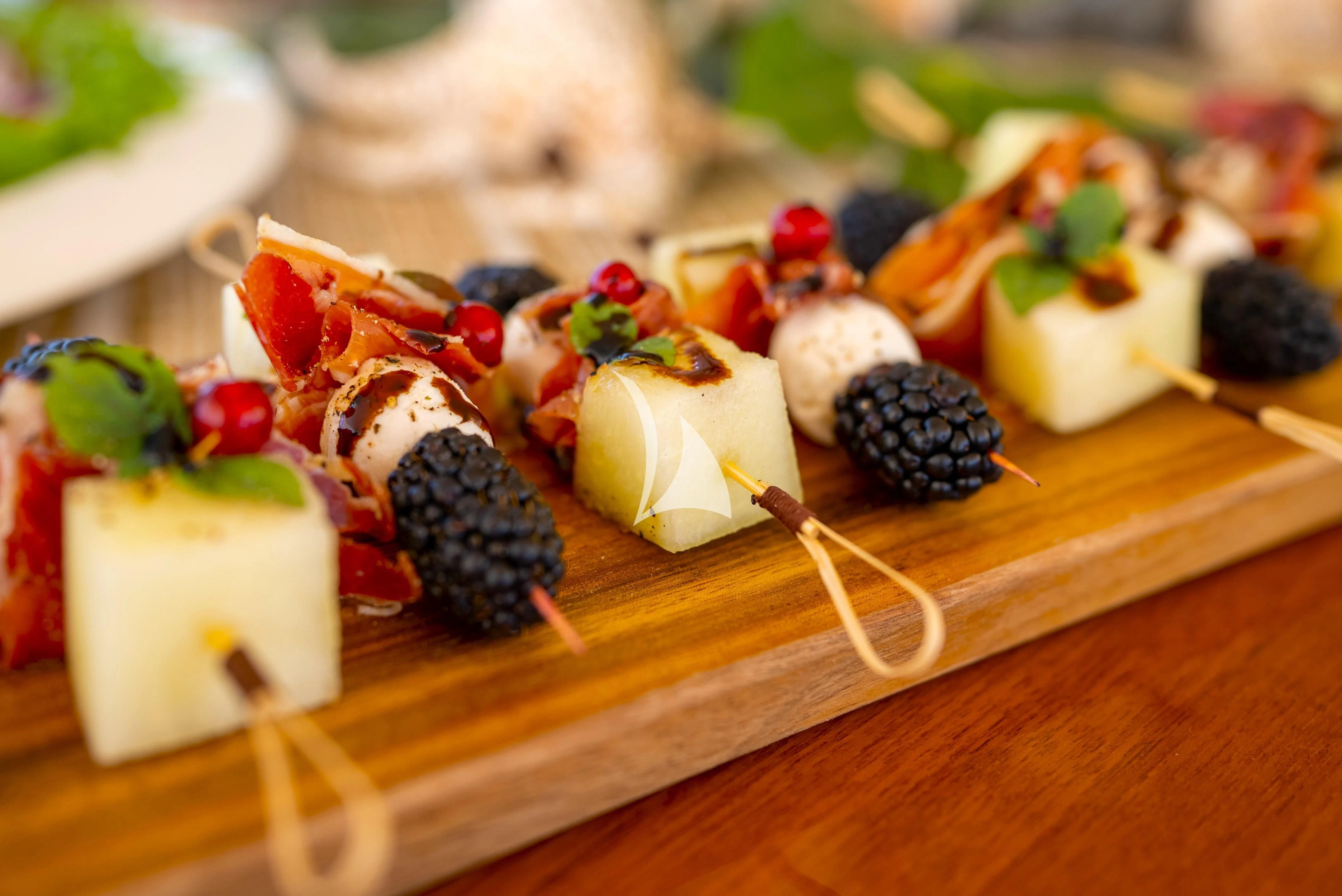 a group of desserts on a table aboard NO.9 Yacht for Sale