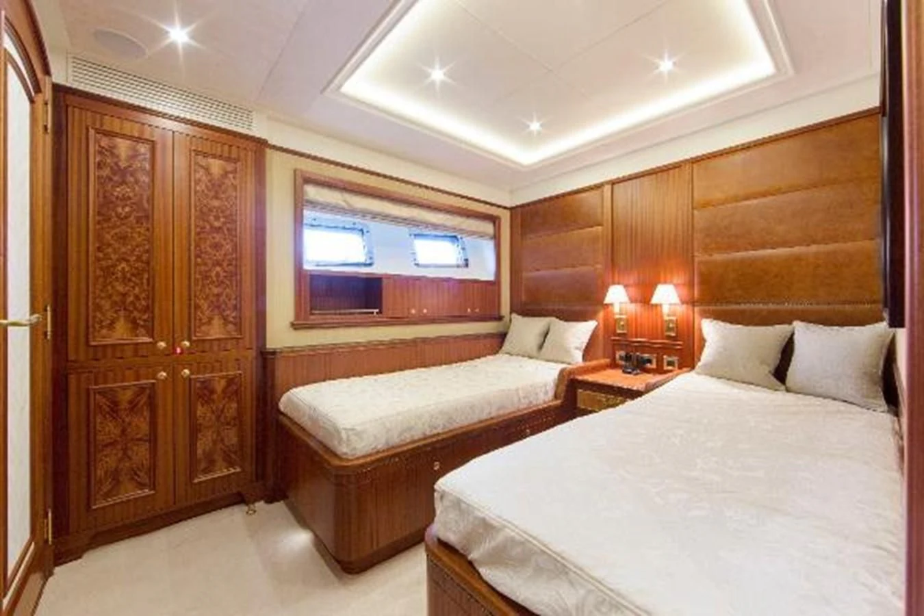 a room with two beds aboard 121FT EXPLORER 37 Yacht for Sale