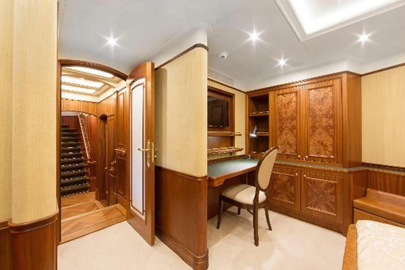 a room with a desk and a chair aboard 121FT EXPLORER 37 Yacht for Sale