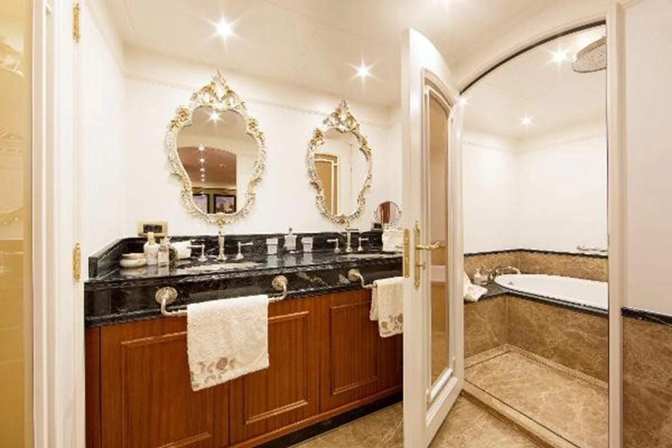 a bathroom with a marble counter top aboard 121FT EXPLORER 37 Yacht for Sale