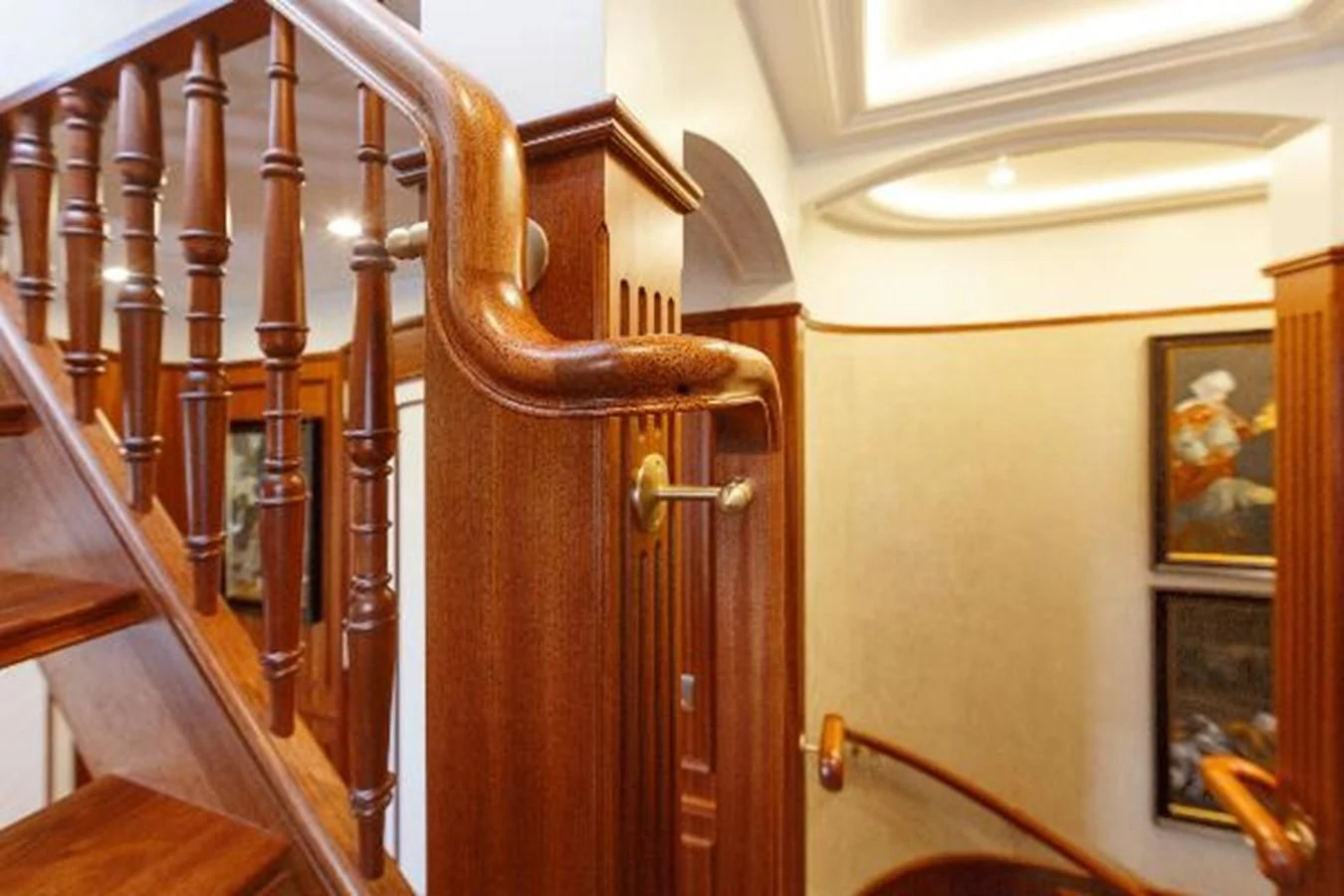 a wooden staircase with a wood railing aboard 121FT EXPLORER 37 Yacht for Sale