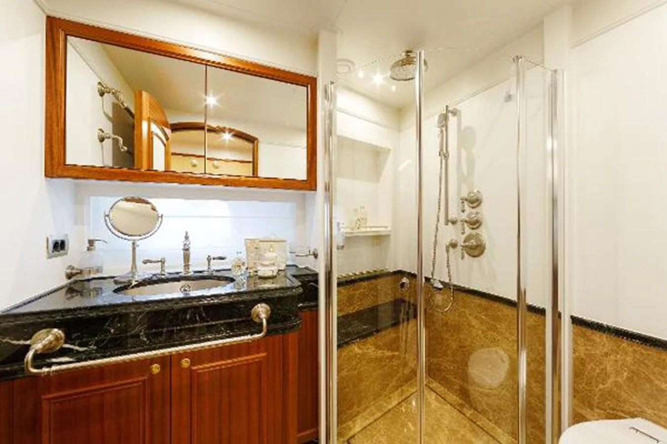 a bathroom with a glass shower aboard 121FT EXPLORER 37 Yacht for Sale