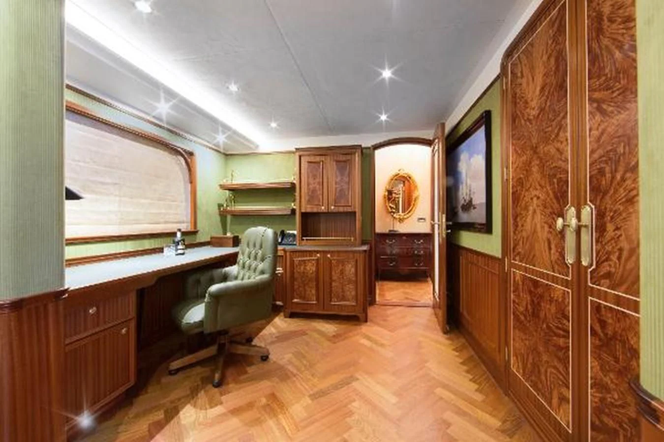 a room with a desk and a chair aboard 121FT EXPLORER 37 Yacht for Sale