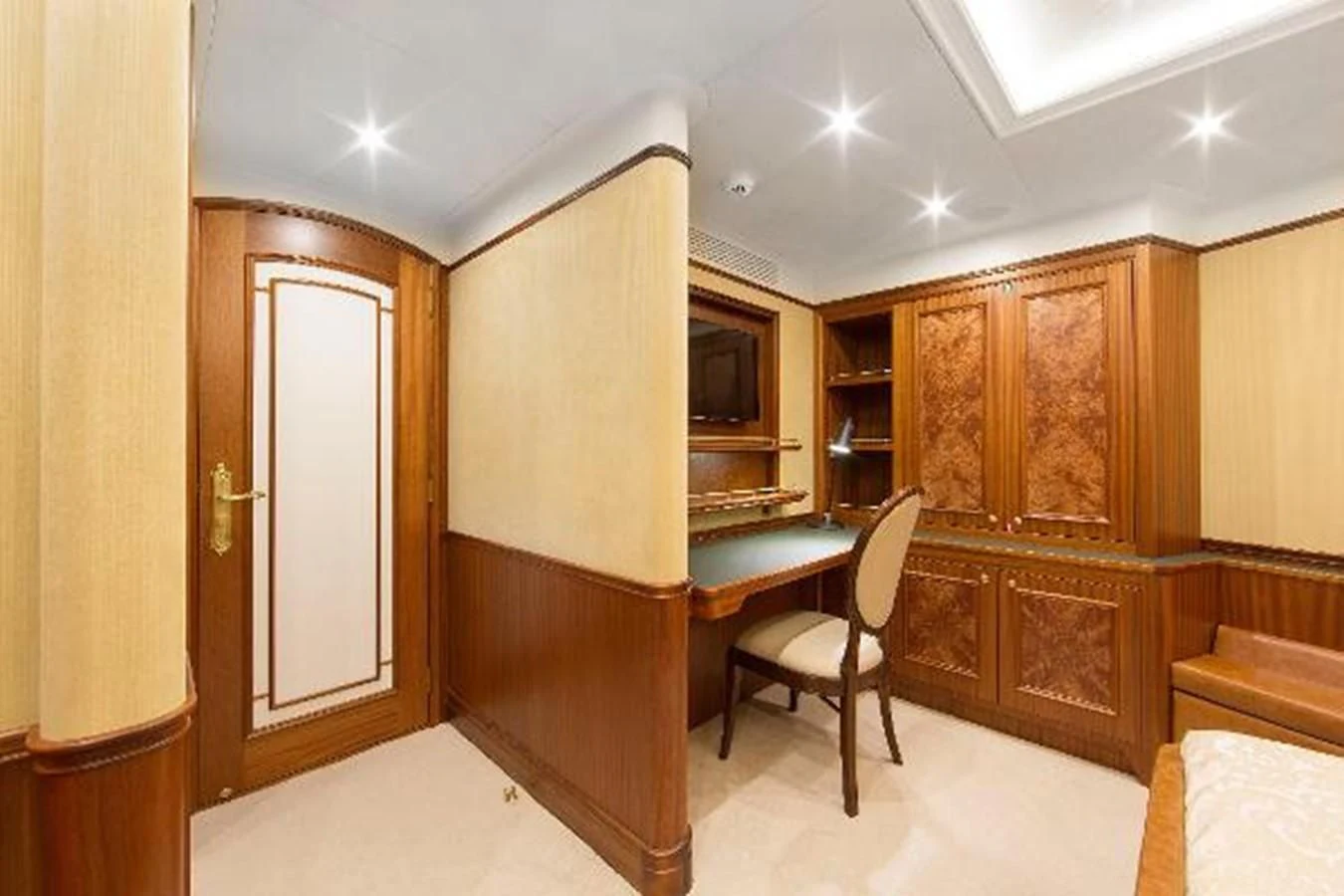 a room with wooden cabinets aboard 121FT EXPLORER 37 Yacht for Sale