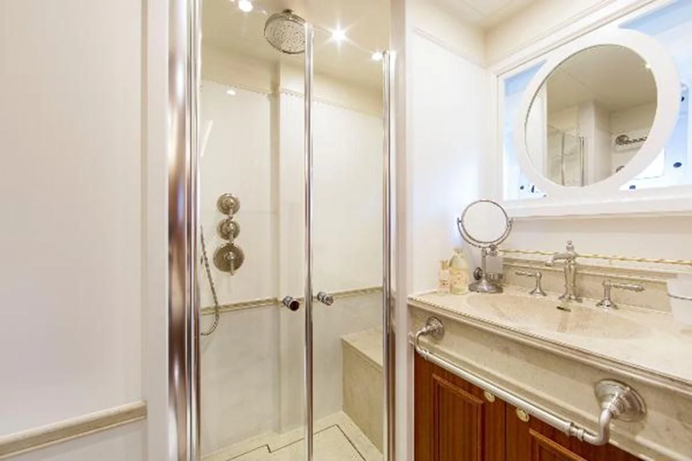 a bathroom with a glass shower aboard 121FT EXPLORER 37 Yacht for Sale