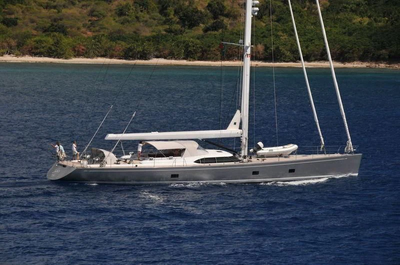 a white boat on the water aboard AGAPI MAS Yacht for Sale