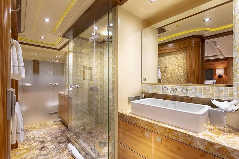 a bathroom with a large shower aboard LUMIR Yacht for Sale